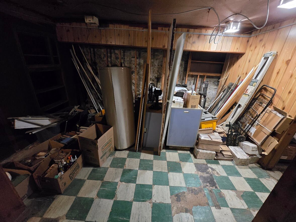 Basement junk before removal in Astoria