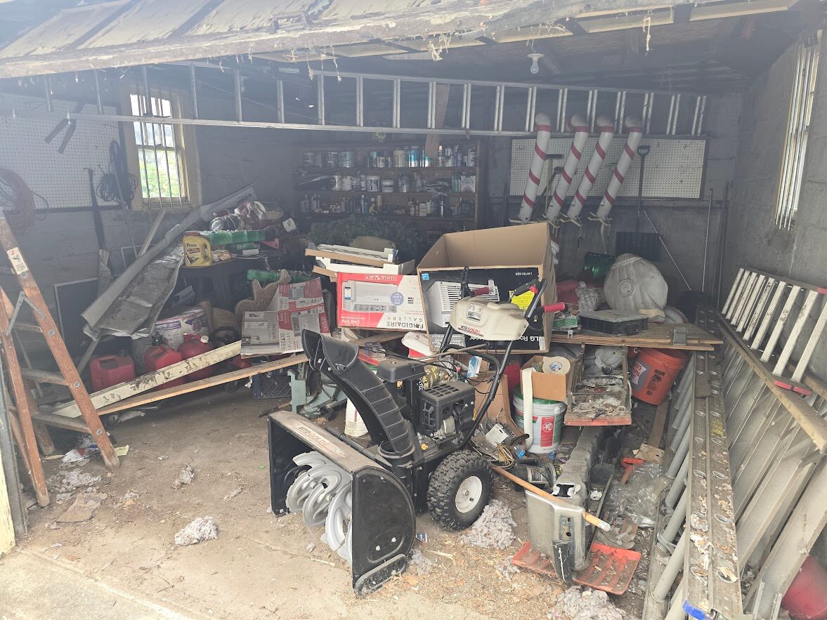 Garage garbage before removal in Mineola