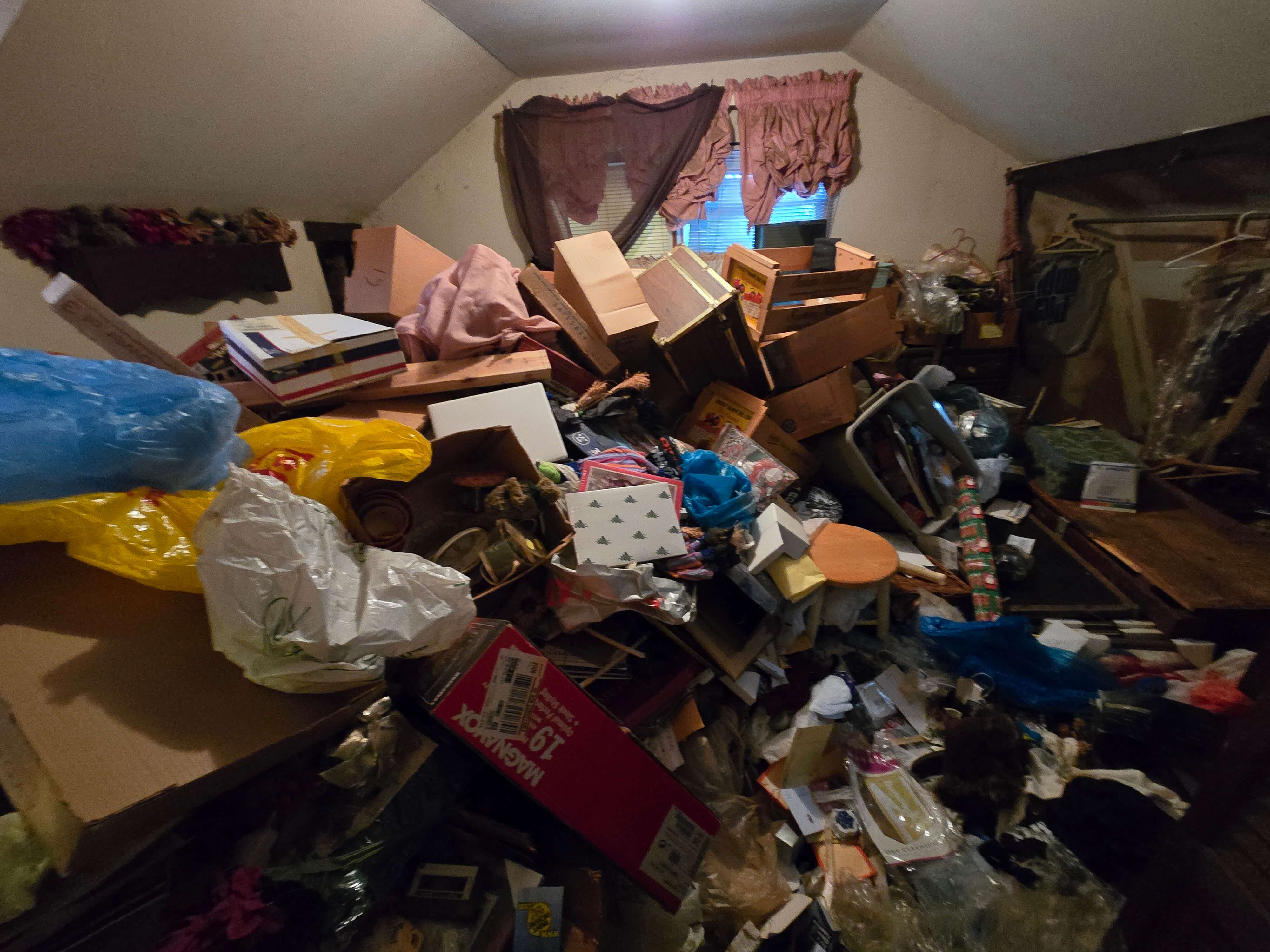 Hoarder junk before removal in NYC