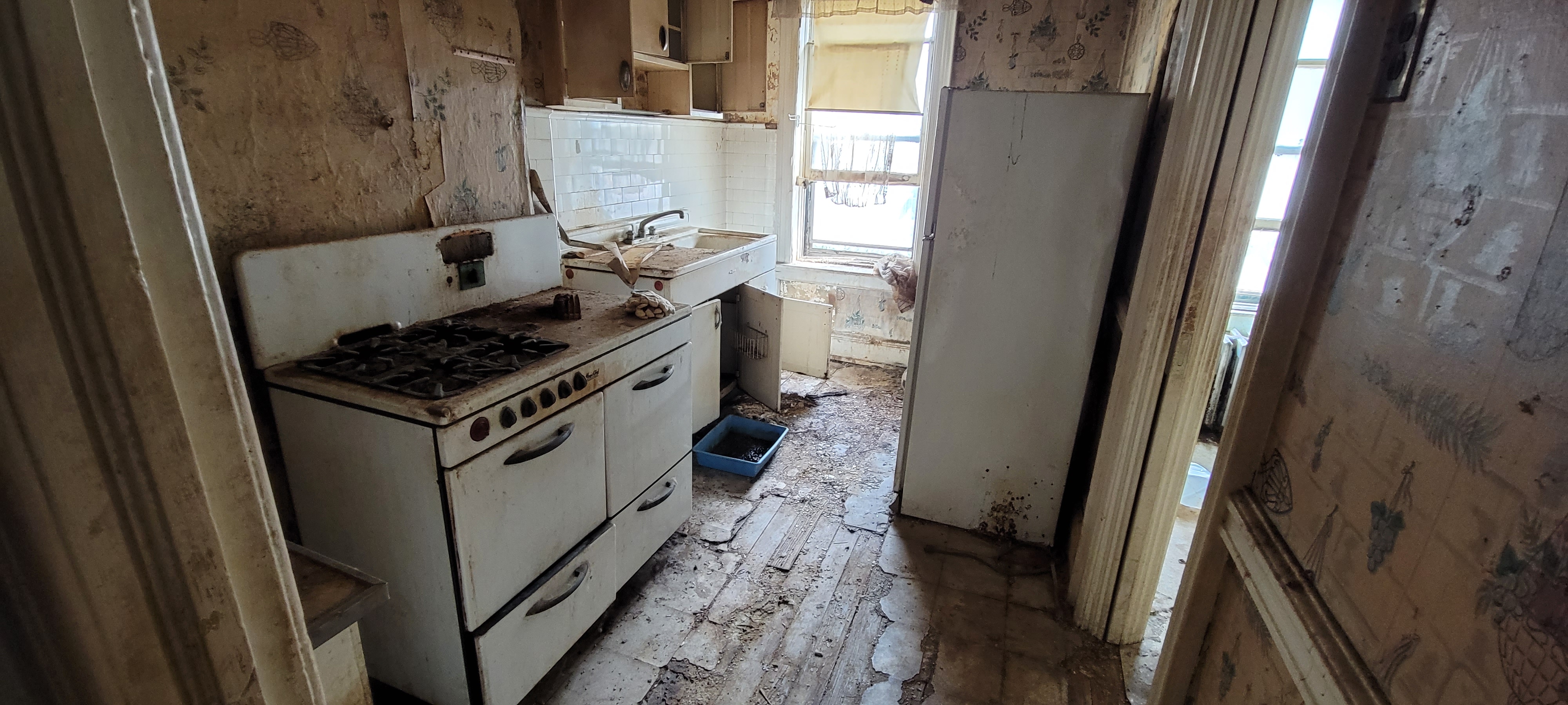 Hoarder kitchen after cleaning in Queens