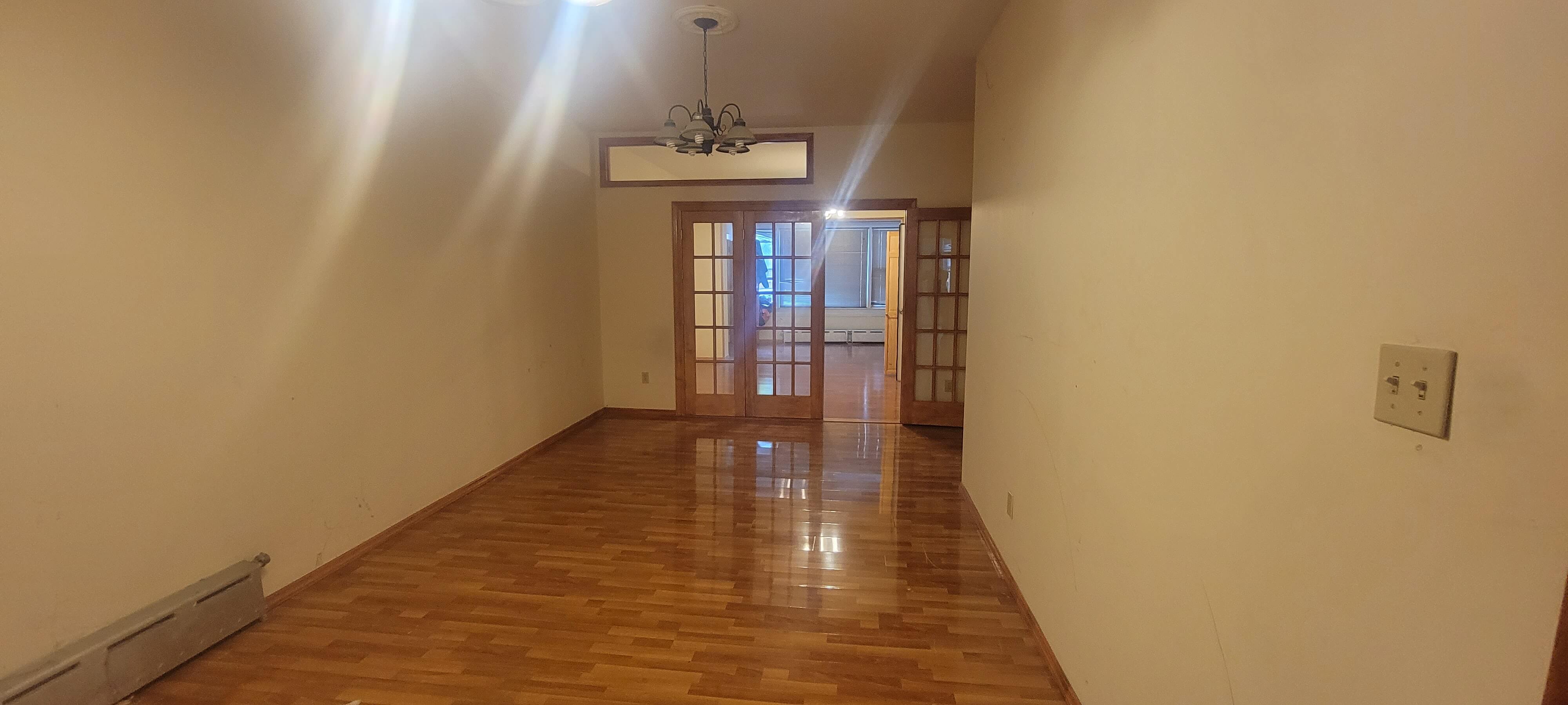 Hoarder living room after cleanout in NYC