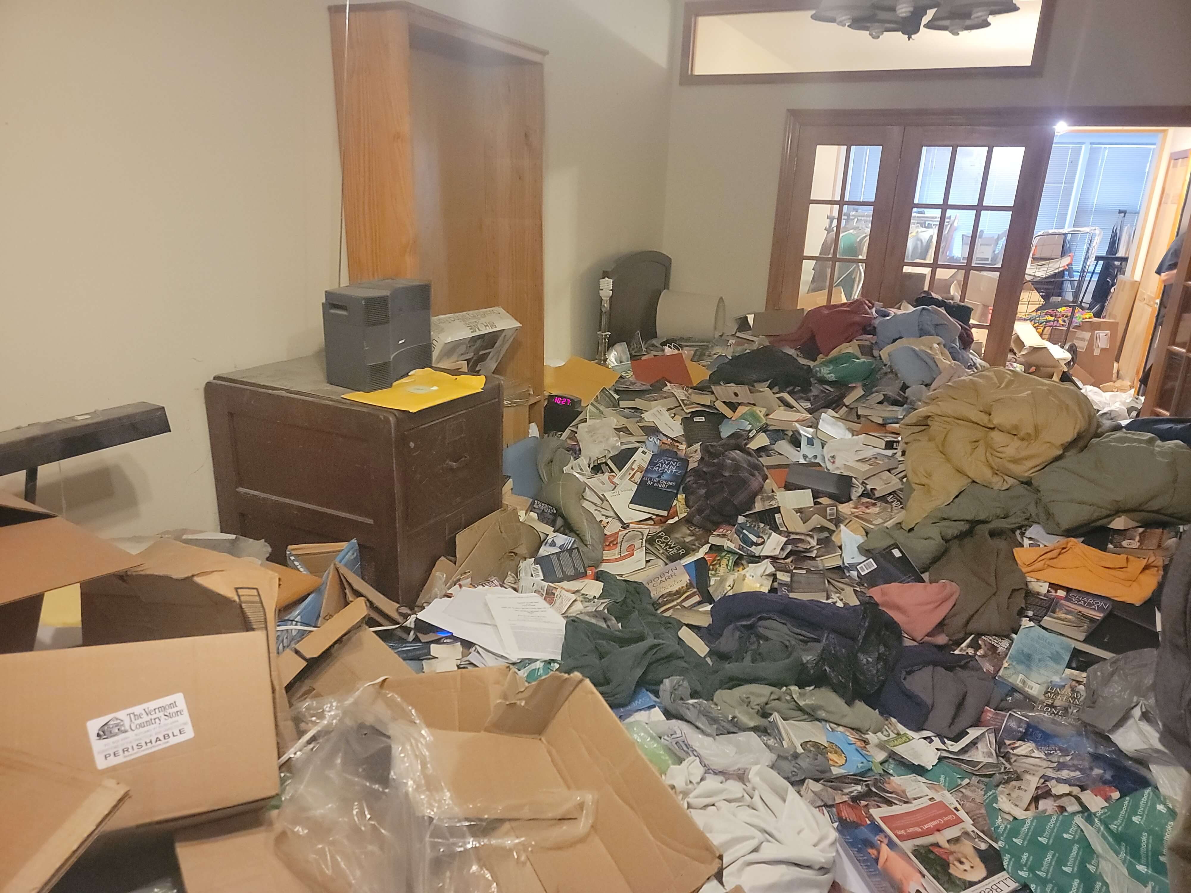 Hoarder living room before cleanout in NYC