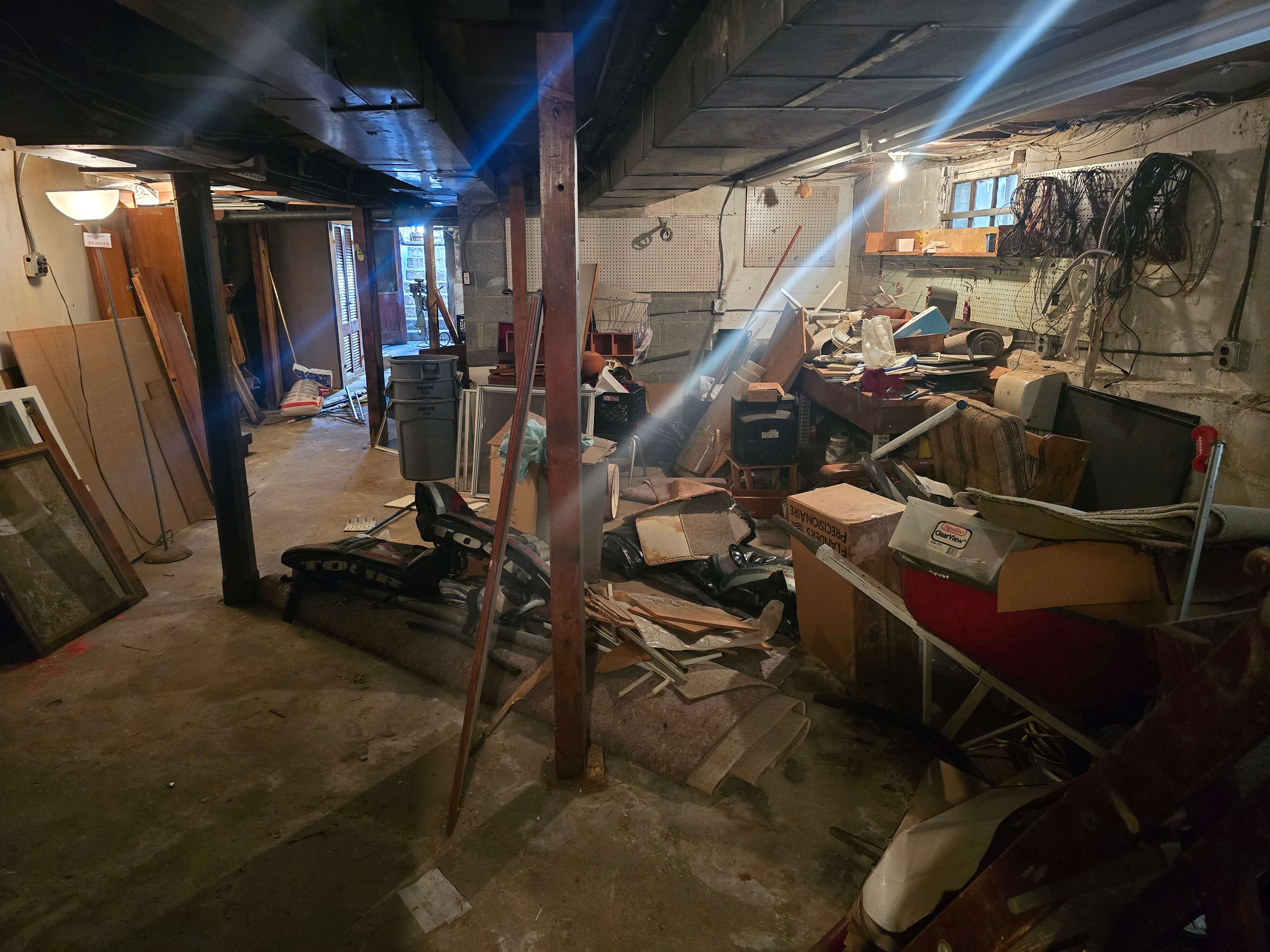 Before basement cleanout in Queens, NY