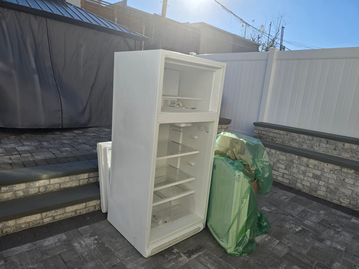 Refrigerator before pickup in Middle Village