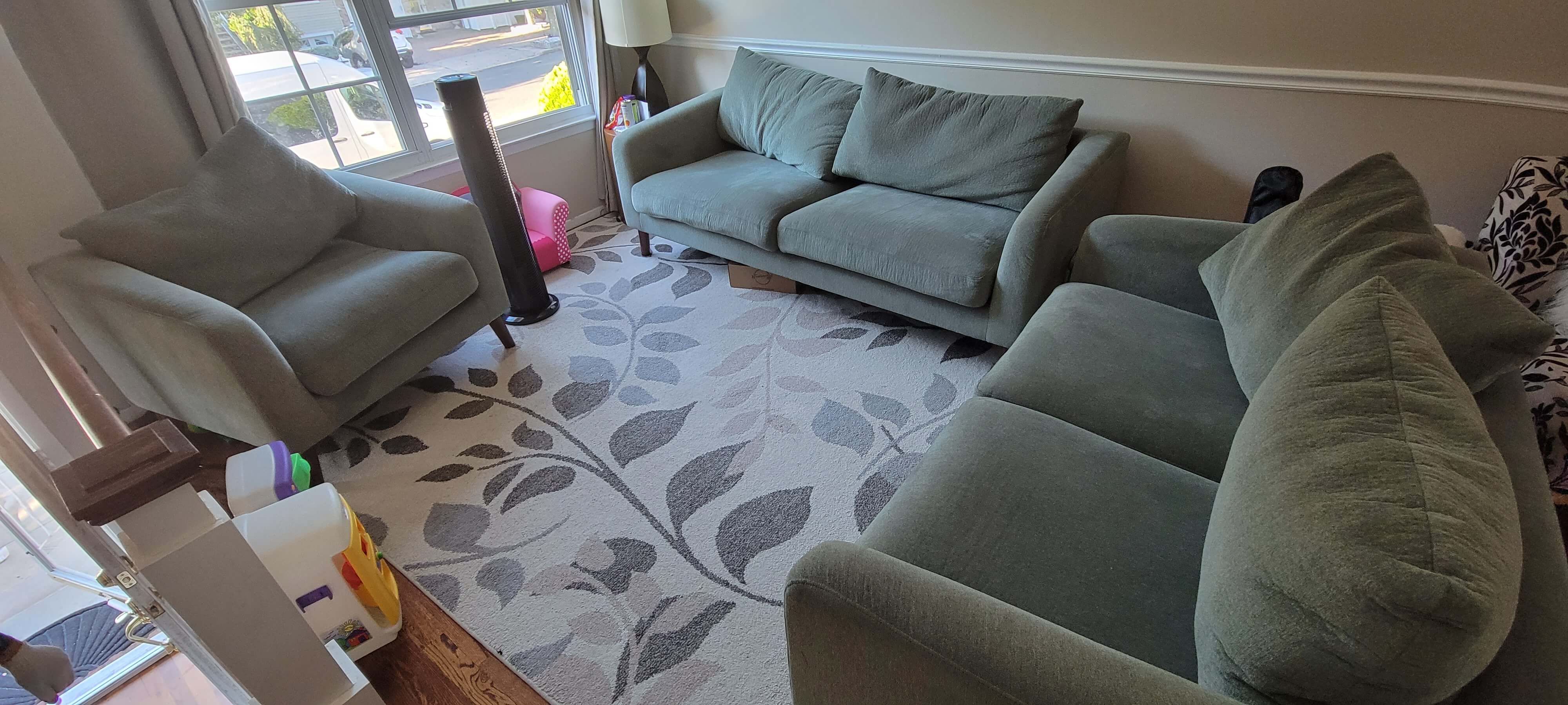 Before sofa removal in Glendale, NY